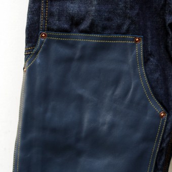 LEATHER-FRONT DENIM PANTS