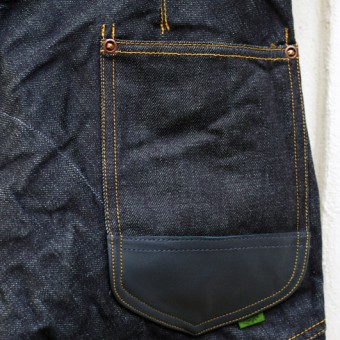 LEATHER-FRONT DENIM PANTS