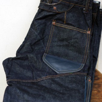 LEATHER-FRONT DENIM PANTS